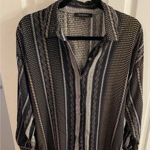 Chic long sleeve button down dress with belt.